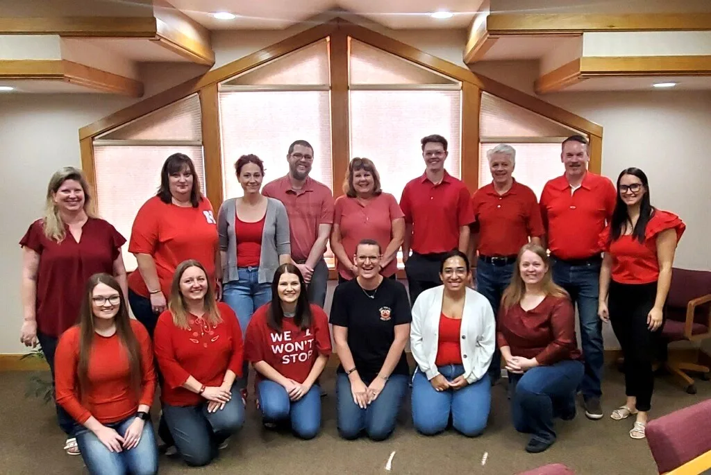 Staff Dressed Up for Red Friday